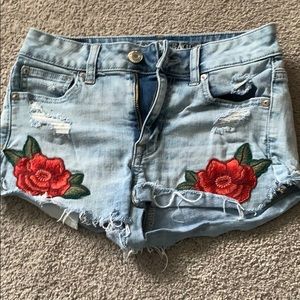 american eagle jean shorts with roses